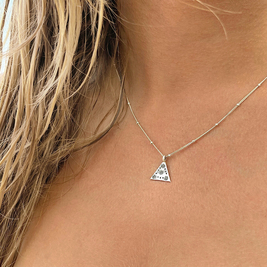 Sterling silver Hill Tribe triangle pendant on silver satellite chain