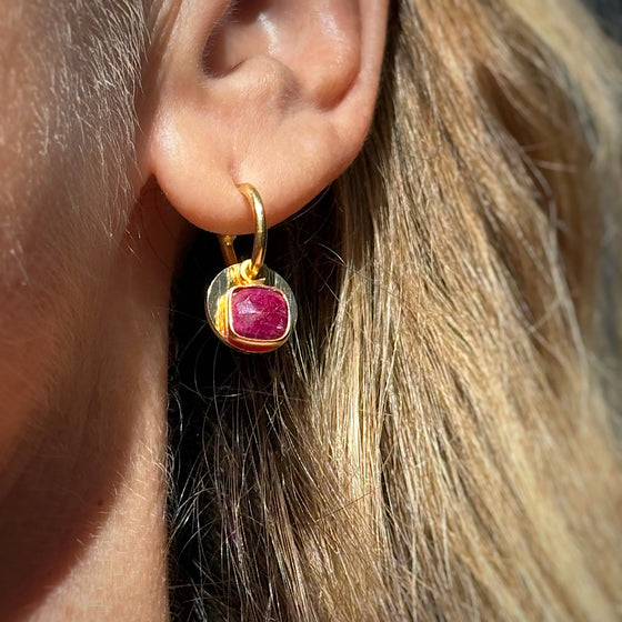 Ruby Gemstone Earrings with solar discs on Gold plated hoops