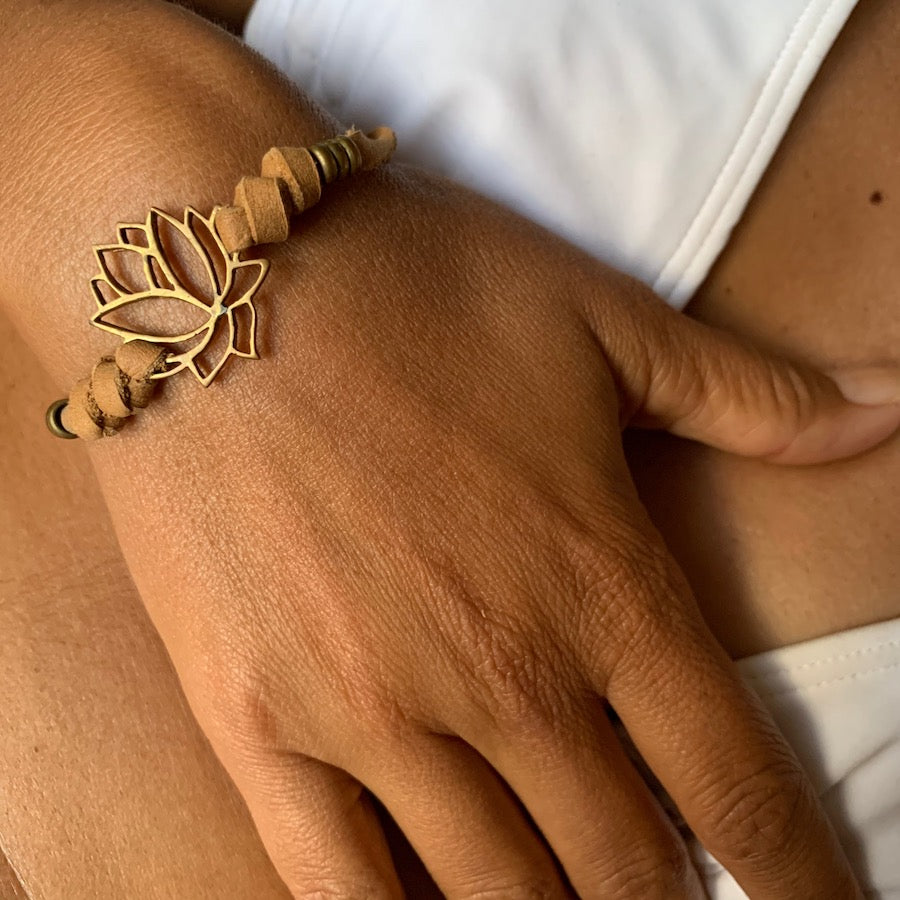 brass Lotus charm bracelet on suede leather