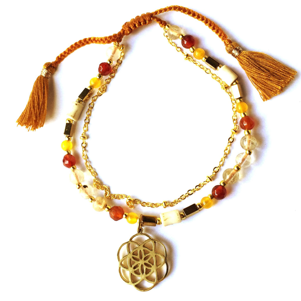 This gorgeous Seed Of Life yoga charm bracelet is made with loving intention from healing gemstones of Carnelian Agate, Citrine, Topaz. Featuring a hand crafted brass Seed Of Life sacred geometry charm