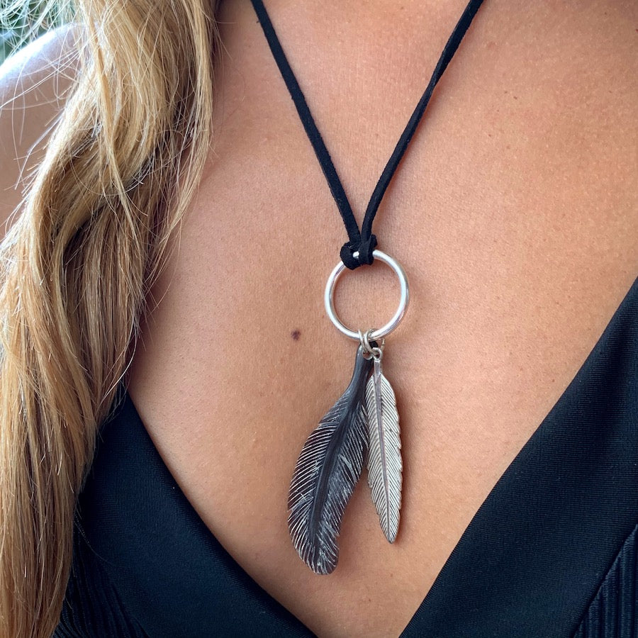 Silver Feather charm and carved Feather pendant on leather Necklace